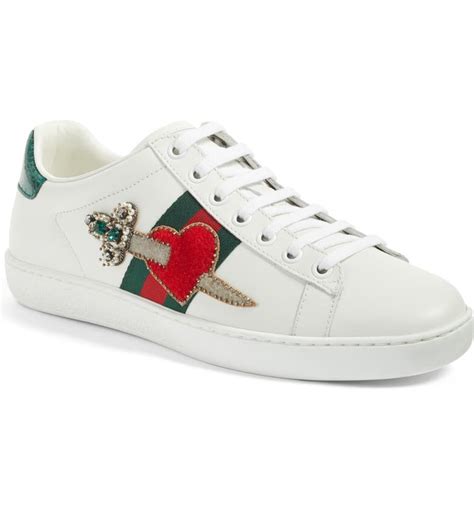 gucci rubber shoes with heart|Gucci pierced heart ace sneakers.